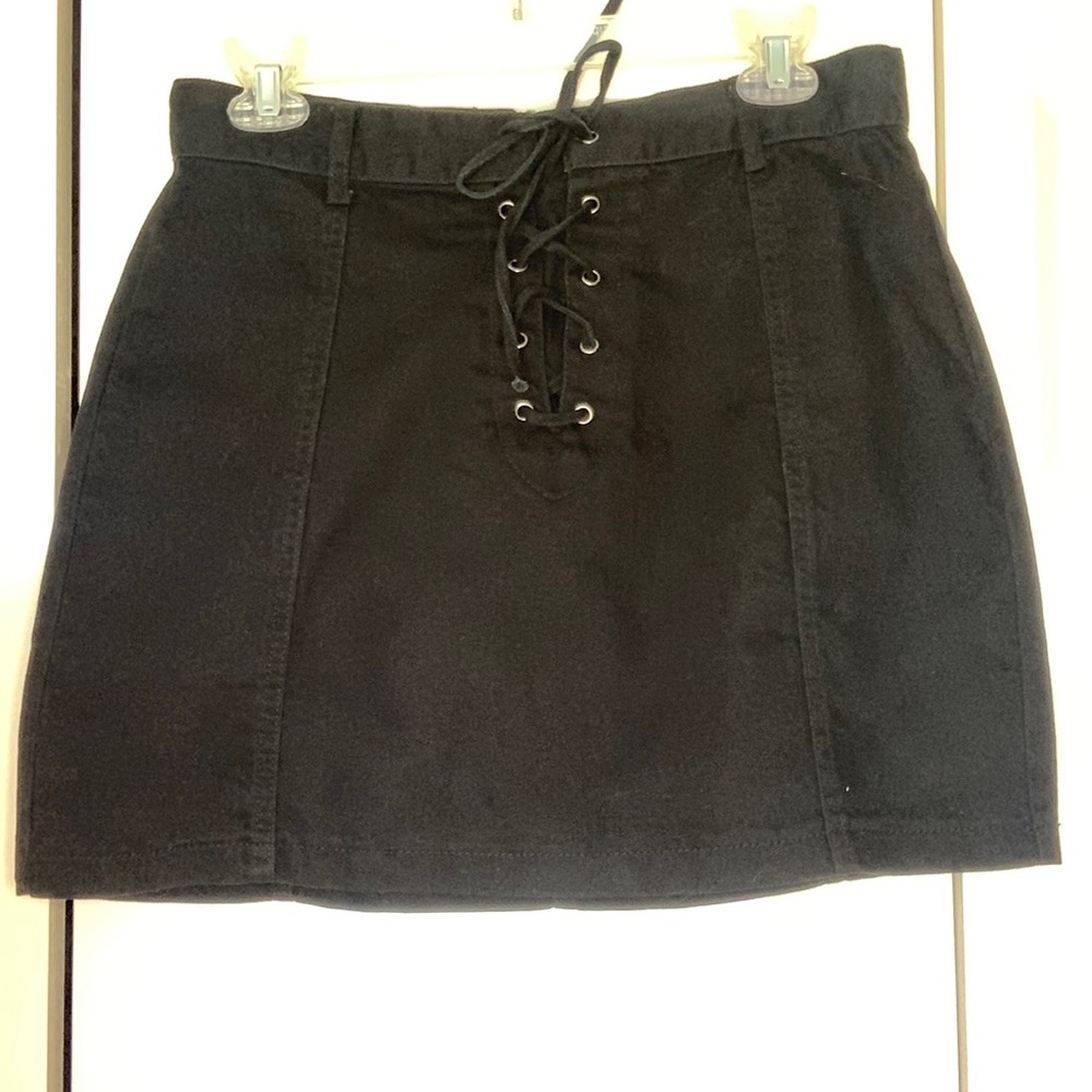 This is a black mini skirt